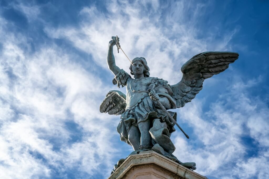 Saint Michael archangel statue at top of Saint Angelo castle